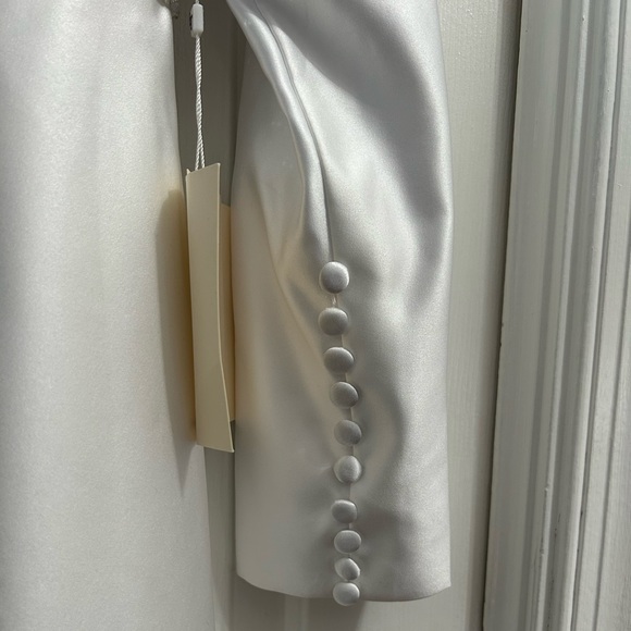 Wedding dress with tags. Rhinestone embellished at waist,real button closure. - Picture 5 of 7